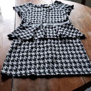 Classic houndstooth peplum dress